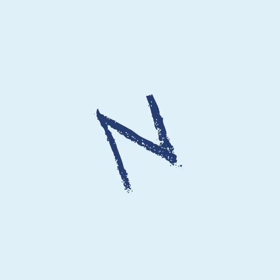 The image displays a stylized letter N with a blue background and a speckled texture resembling paint splatters.